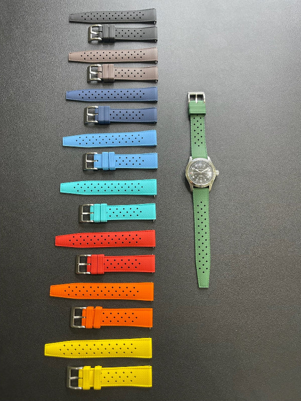 Cinturino Tropic in caucciù con sgancio rapido, disponibile in 9 colori, ansa 20mm, stile vintage e sportivo.