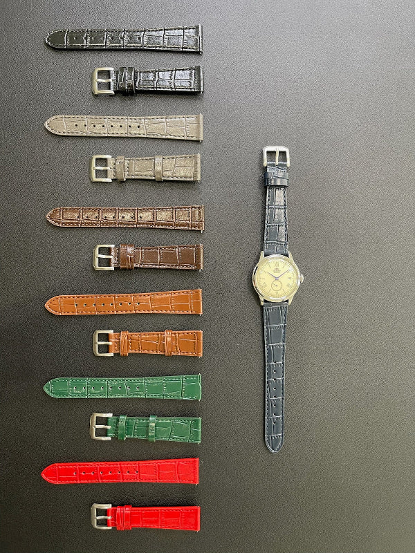 Cinturino in vera pelle con stampa coccodrillo, disponibile in 6 colori, ansa 18mm/20mm, con sgancio rapido.