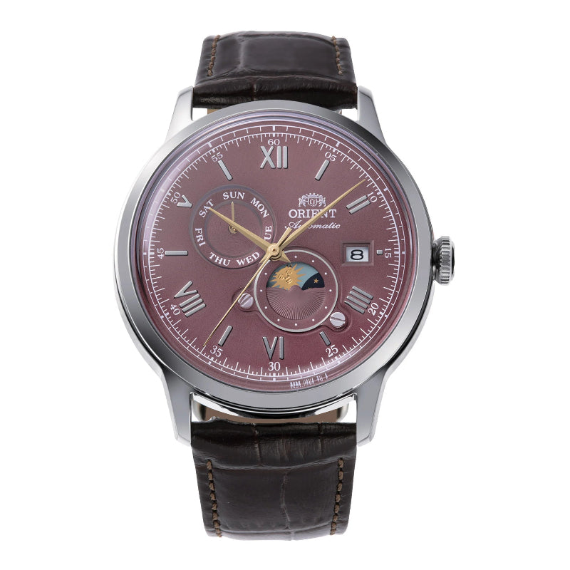 Orologio Orient RA‑AK0807R Bambino Sun & Moon con quadrante rosso rubino, vista frontale.