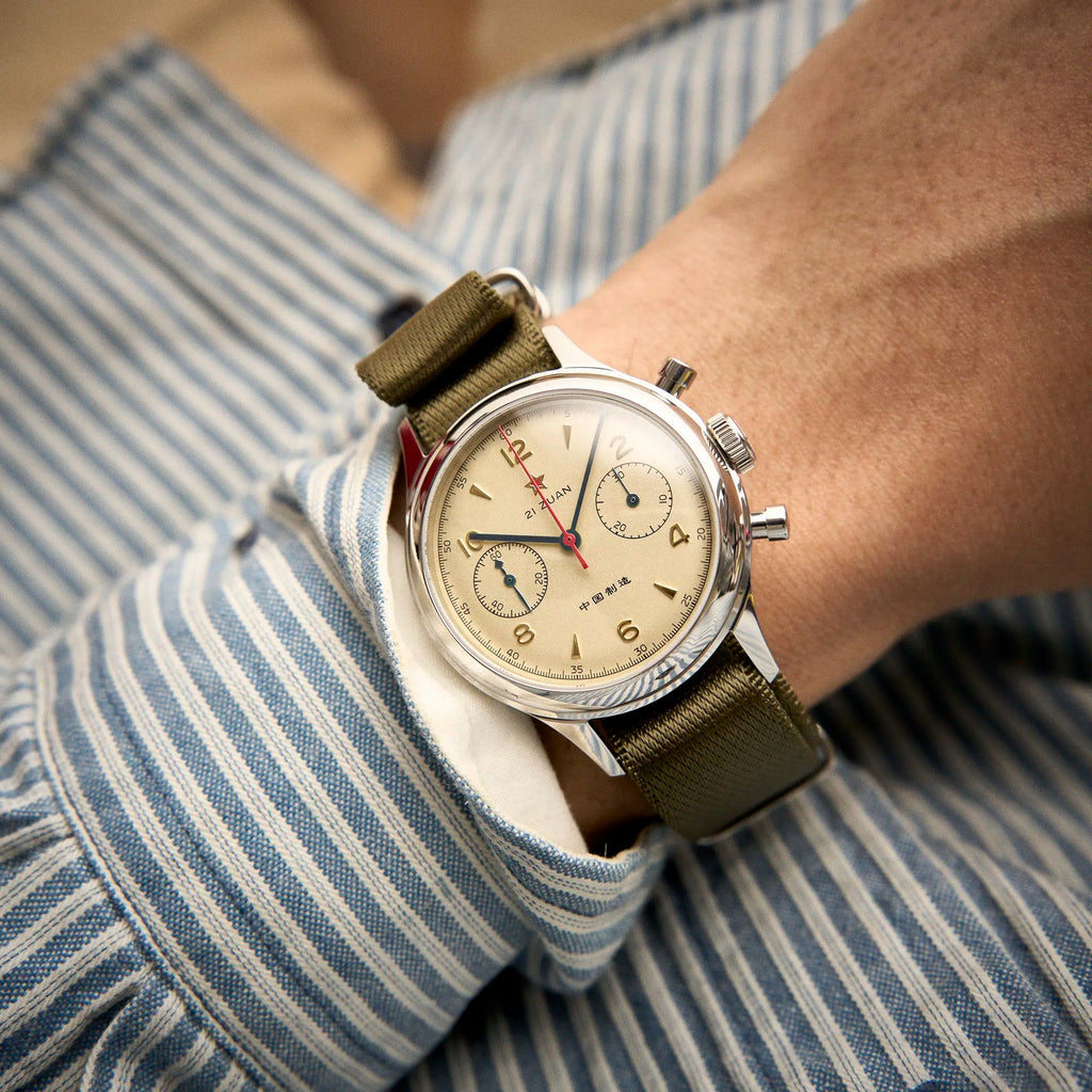 Orologio Seagull 1963 cronografo meccanico 38 mm  / 40 mm con vetro zaffiro, quadrante champagne e doppio cinturino, stile vintage militare.